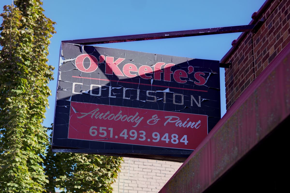 The hanging O'Keeffe's Collision Autobody and Paint sign